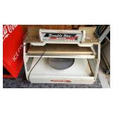Double Kay Nuts lighted display case