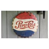 Pepsi bottle cap sign