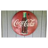Coca-Cola button sign