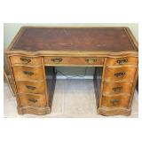 7 Drawer Curved Front Leather Inlaid Top Desk