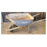 Wooden Handle Rusty Wheelbarrow