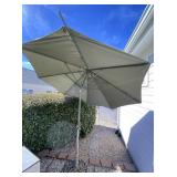 Tilting Green Fabric Patio Umbrella And Stand