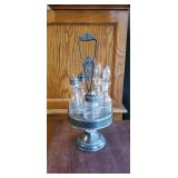 Silver table caddy, shakers, cruets