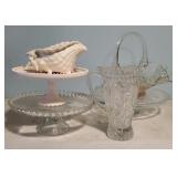 Cake risers, crystal pitcher, glass basket