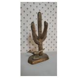 Gold road runner sculpture