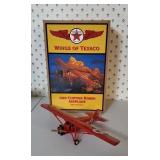 Wings of Texaco 1929 Curtiss Robin airplane bank