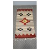 Aztec wool rug with fringe