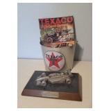 Texaco bucket, race car trophy, book