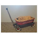 Decorative radio flyer wagon, dog statue, bed