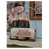 Vintage metal Pepsi bottle holder, soda bottles