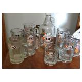 A&W beverage lot
, half gallon jug, mugs (7)