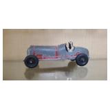 Vintage toy race car, driver