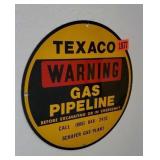 Round Texaco gas pipeline sign