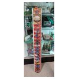 Assortemt of Racing Champion toys (15+), rack