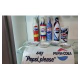Pepsi apron, fluted decorative tins, metal bottles
