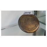 Pepsi brass sidewalk marker