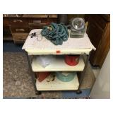 Metal shelf-cart on wheels with contents