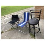 4 Chairs: 2 Blue folding chairs, 1 bag chair, &