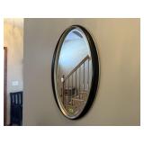 Oval beveled wall mirror