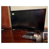 Insignia 24" television, remote