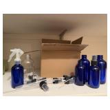 Cobalt blue bottles, pumps, spray nozzles