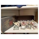 Miniature needlepoint calendar sampler pillows,