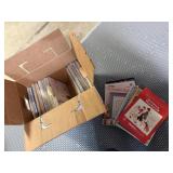 Box of cross-stitch, needlepoint pattern books &