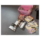 Tote of cross-stitch, needlepoint patterns,