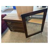 Dresser with attached mirror