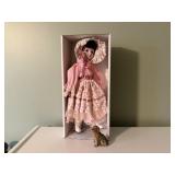 Porcelain collectible doll, dog