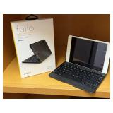 Backlit, hinged keyboard folio