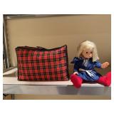 Toy doll, plaid suitcase of doll clothes