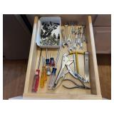 Contents of tool drawer, vise grips,