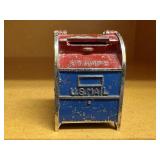 Vintage U.S. mailbox stamp dispenser