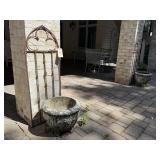 Concrete planters (2), iron trellis (2)