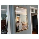 Gold beveled wall mirror