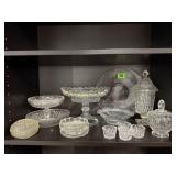 Shelf of assorted crystal, glassware