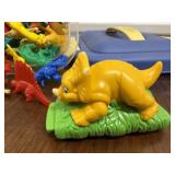 Tote of toy dinosaurs