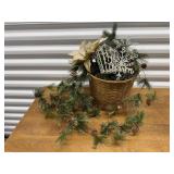 Basket, holiday greenery, snowflakes, wire