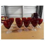 Tote of ruby red drinkware, pitcher