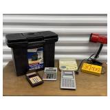 Calculators, file box, clamp light, scale
