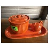 Orange Fiestaware jar, shaker, dish