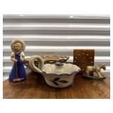 Pottery candlestick, wooden clock, carved rocking