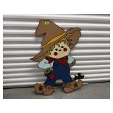 Handcrafted scarecrow garden decoration