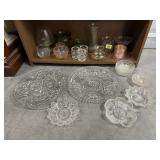 Shelf of assorted glassware, platters