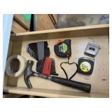 Hammer, allen wrenches, tape measures, tape