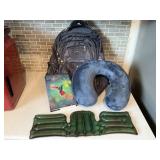 Travel lot, backpack, neck pillow, book, hot/cold