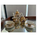 Gold china, teapot, cups (2), saucers (2), an