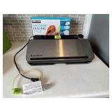 Food Saver vacuum sealer, bags included