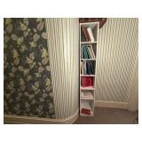 Skinny white bookcase, cookbooks included